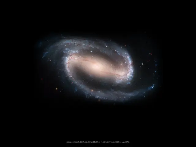 Barred spiral galaxy (NGC 1300), a real image
